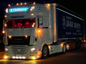 Truck with extra lighting including an orange LED top lamp
