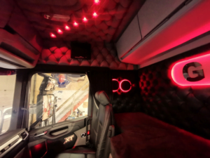 Truck interior with red lights built in the sky